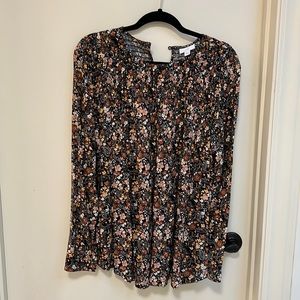 JJill long sleeve blouse black with brown and yellowish orange small flowers.